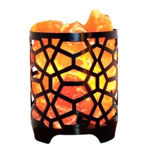 Himalayan Salt Lamp in decorative metal basket with natural orange salt crystals glowing